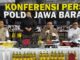 Polda Jabar Ungkap Kasus MinyaKita Ilegal di Subang, Kerugian Masyarakat Capai Ratusan Juta Polda Jabar mengungkap peredaran MinyaKita tak sesuai takaran di Subang Sumber : Antara